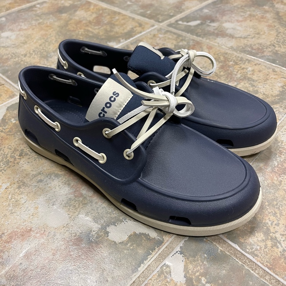 Used twice men’s boat crocs.